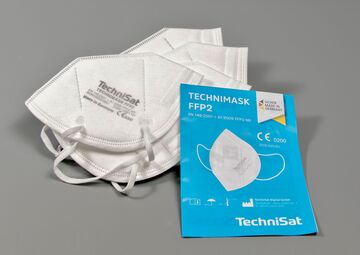 Ansicht auf vier weiße Masken mit der Beschreibung.