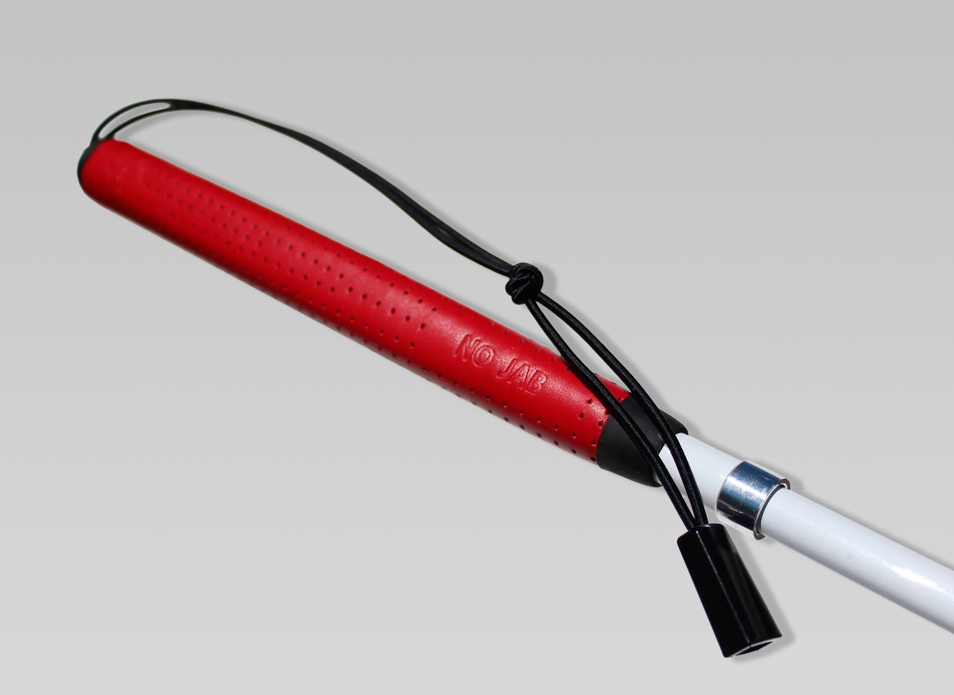 Ansicht auf den roten Griff eines Langstocks.