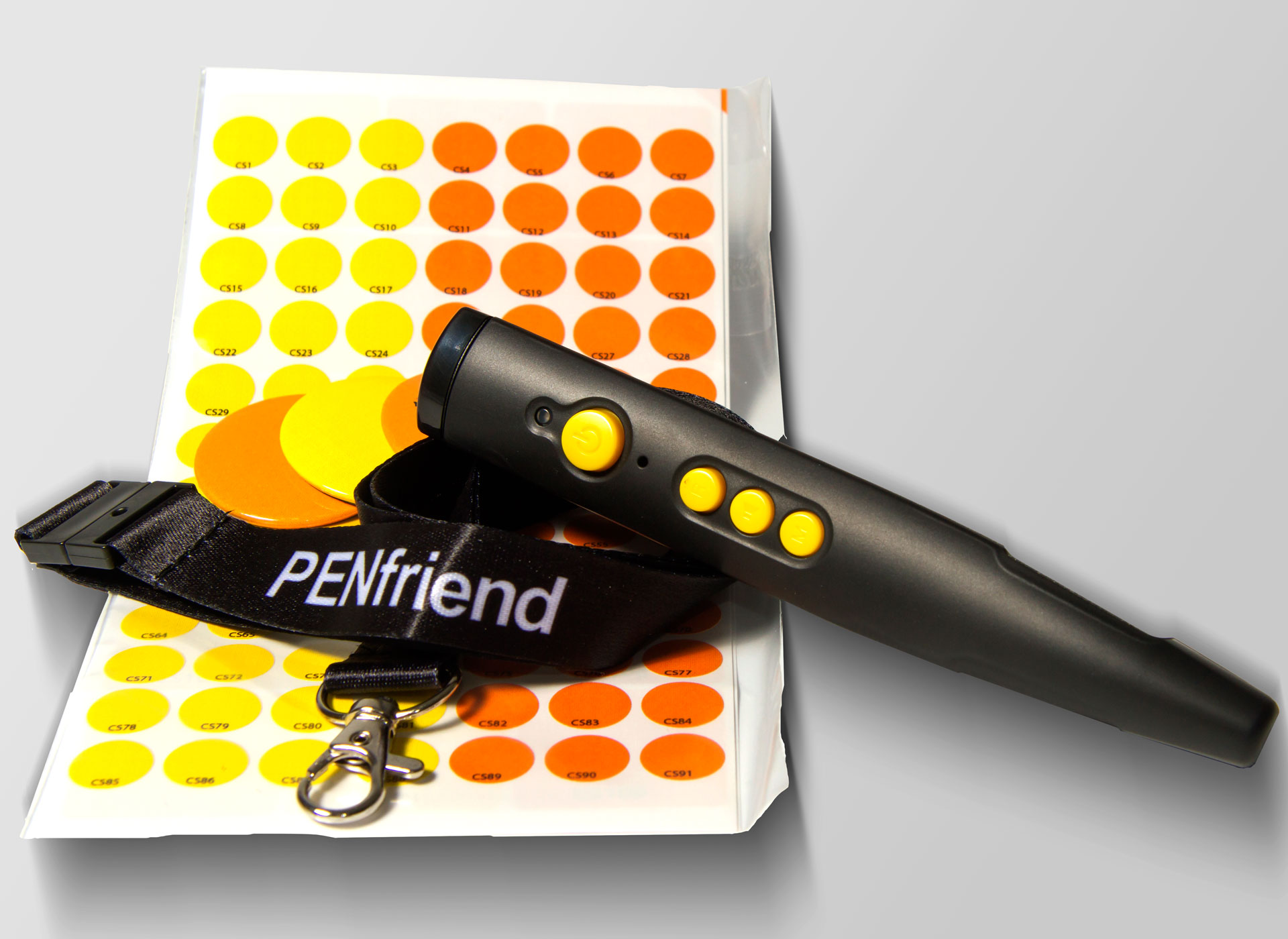Ansicht auf den schwarzen Stift mit Band und gelben und orangenen Klebepunkten.