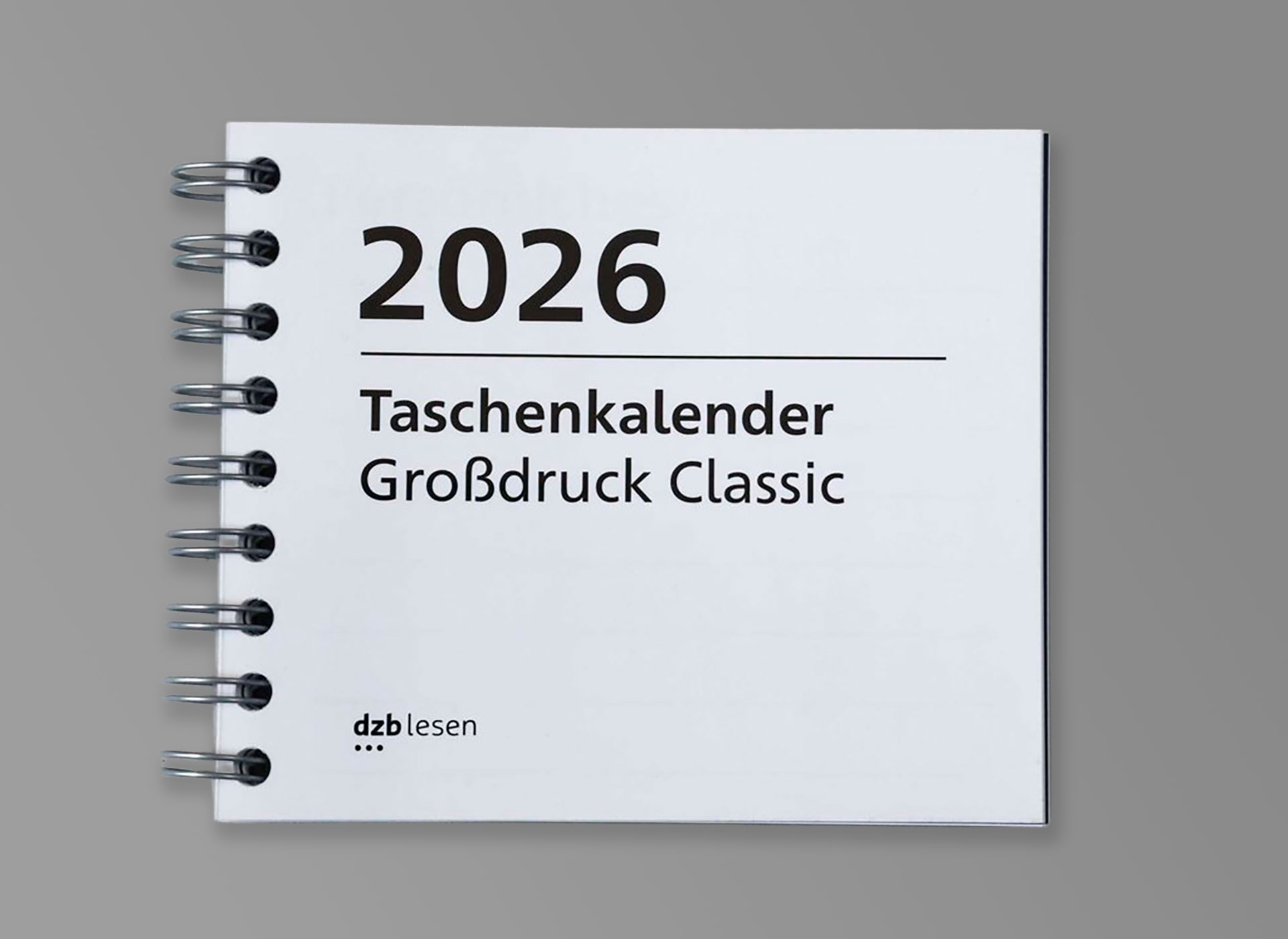 Ansicht auf einen Taschenkalender für 2026 für Sehbehinderte mit Spiralbindung